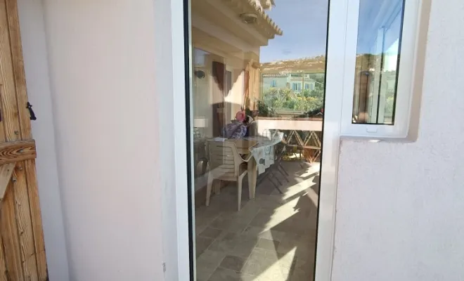 Fermeture d'une terrasse en châssis aluminium